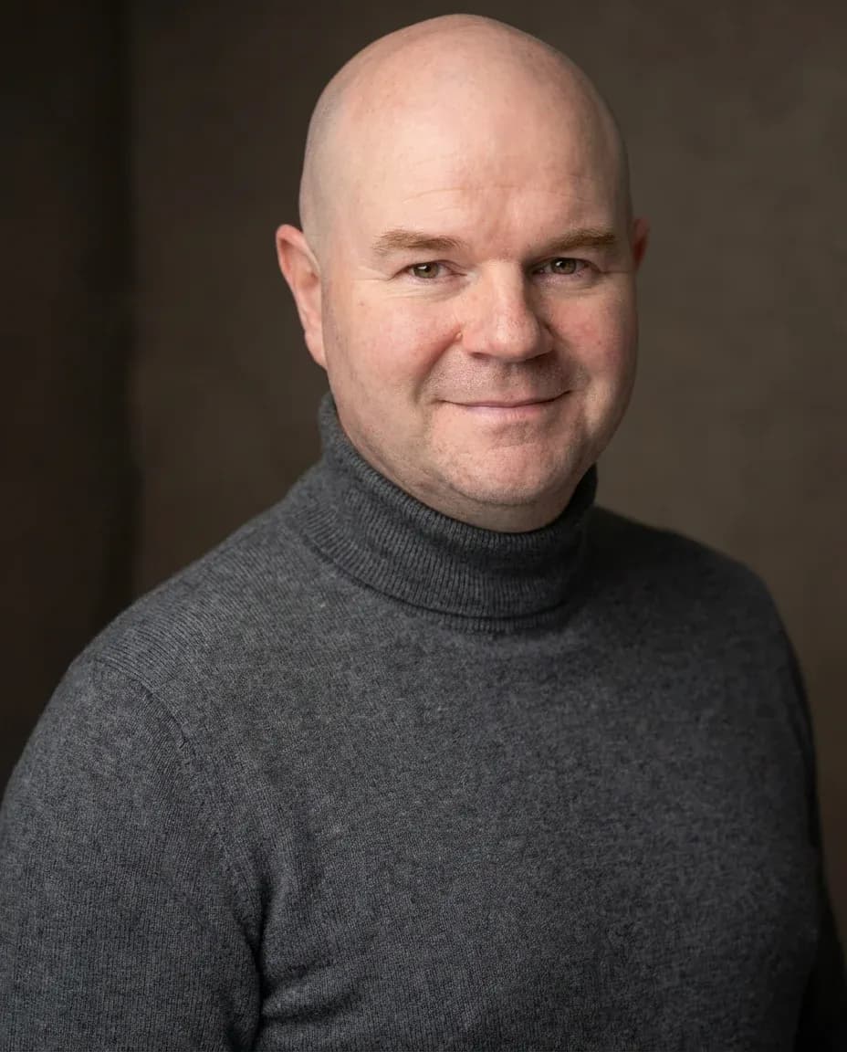 AI Author Headshot of a 50 man by ExecHeadshots