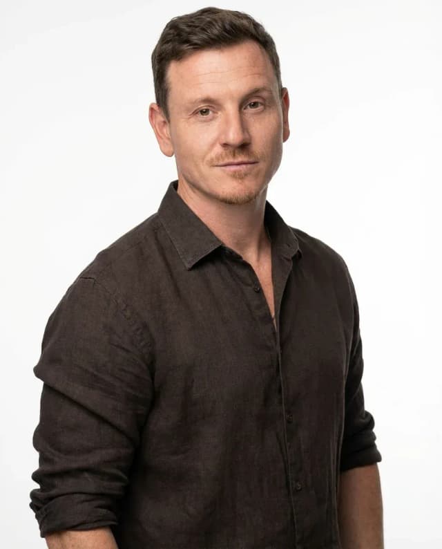 AI Comedian Headshot of a 40 man by ExecHeadshots