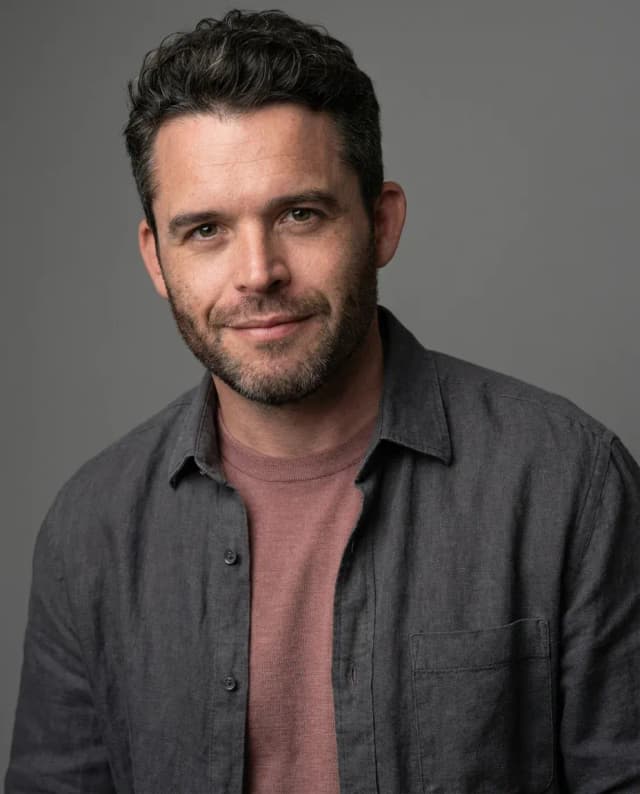 AI Comedian Headshot of a 40 man by ExecHeadshots