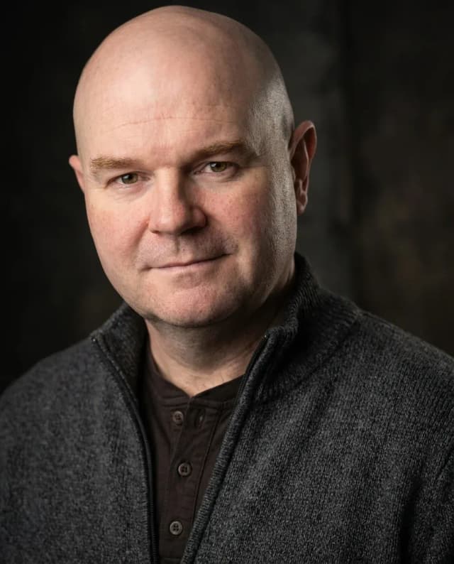 AI Comedian Headshot of a 50 man by ExecHeadshots