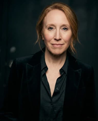 AI Comedian Headshot of a 50 woman by ExecHeadshots