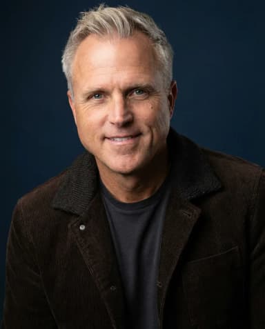 AI Comedian Headshot of a 55 man by ExecHeadshots