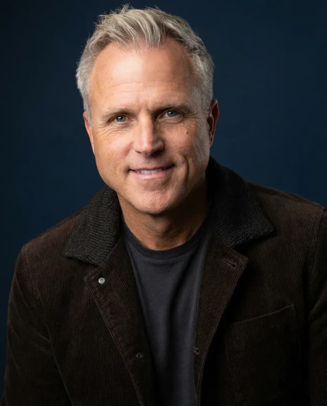 AI Comedian Headshot of a 55 man by ExecHeadshots