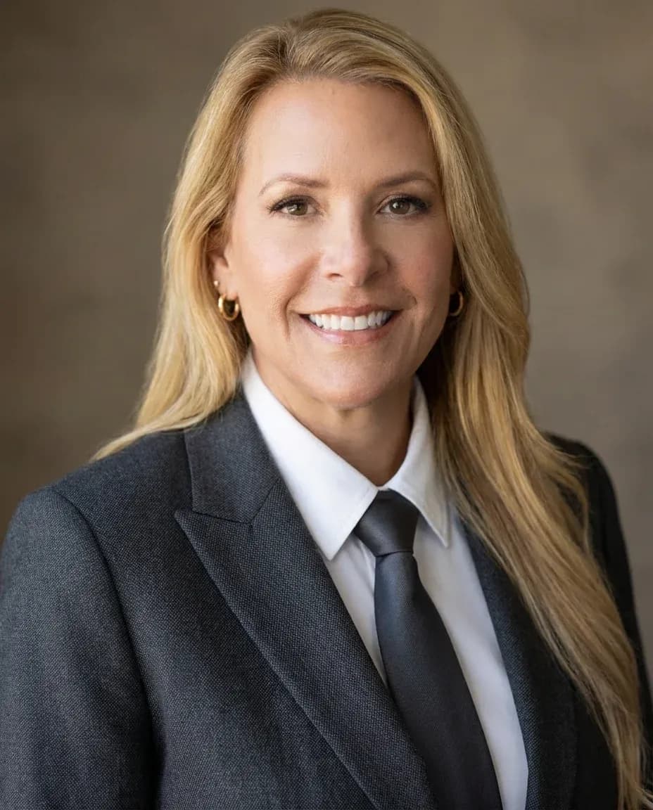 AI Corporate Headshot of a 50 woman by ExecHeadshots