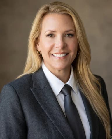 AI Corporate Headshot of a 50 woman by ExecHeadshots