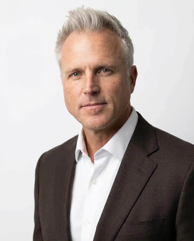 AI Corporate Headshot of a 55 man by ExecHeadshots