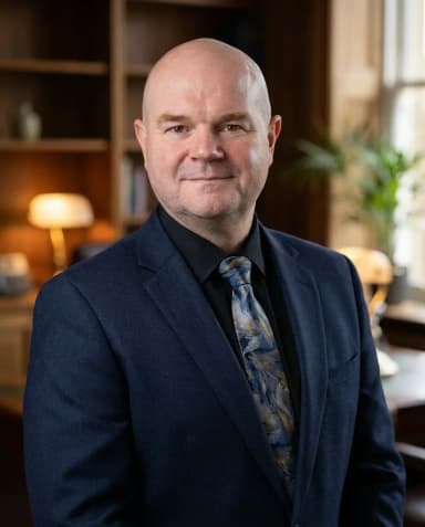 AI Director Headshot of a 50 man by ExecHeadshots