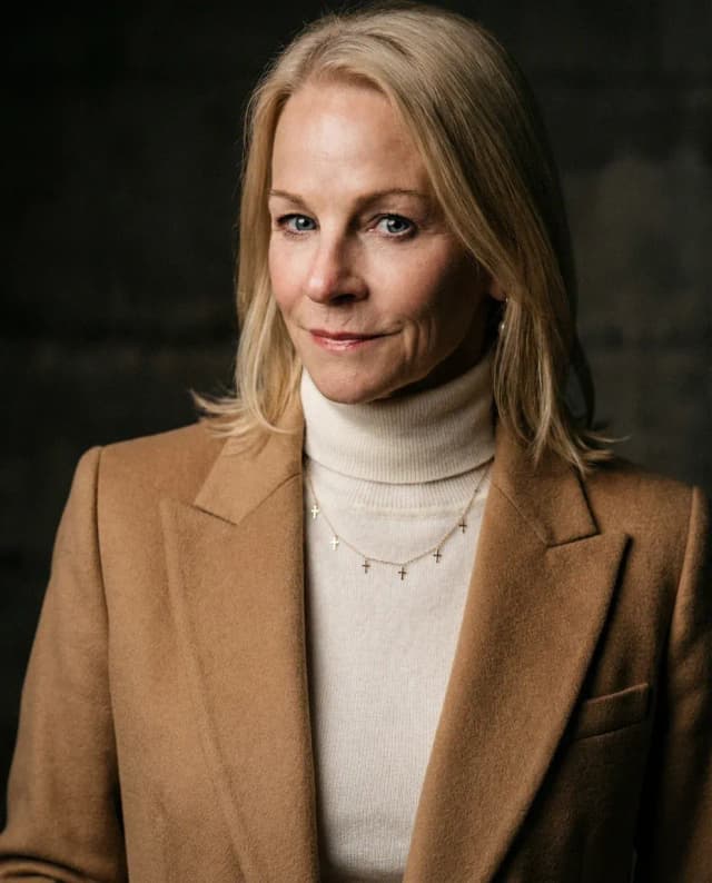 AI Director Headshot of a 55 woman by ExecHeadshots