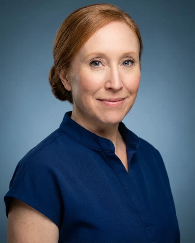 AI Doctor Headshot of a 50 woman by ExecHeadshots