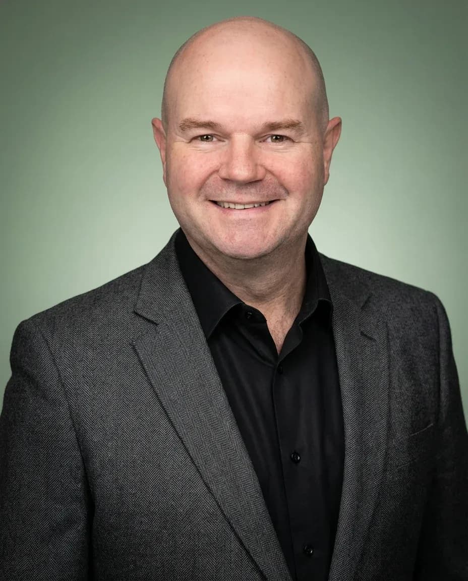 AI Financial Advisor Headshot of a 50 man by ExecHeadshots