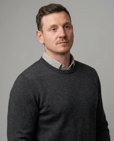 AI Graphic Designer Headshot of a 40 man by ExecHeadshots