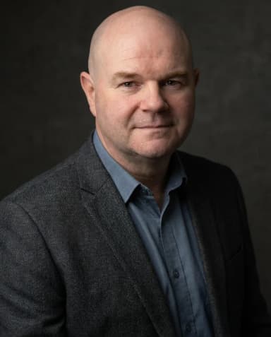 AI Insurance Agent Headshot of a 50 man by ExecHeadshots