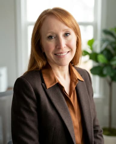 AI Insurance Agent Headshot of a 50 woman by ExecHeadshots