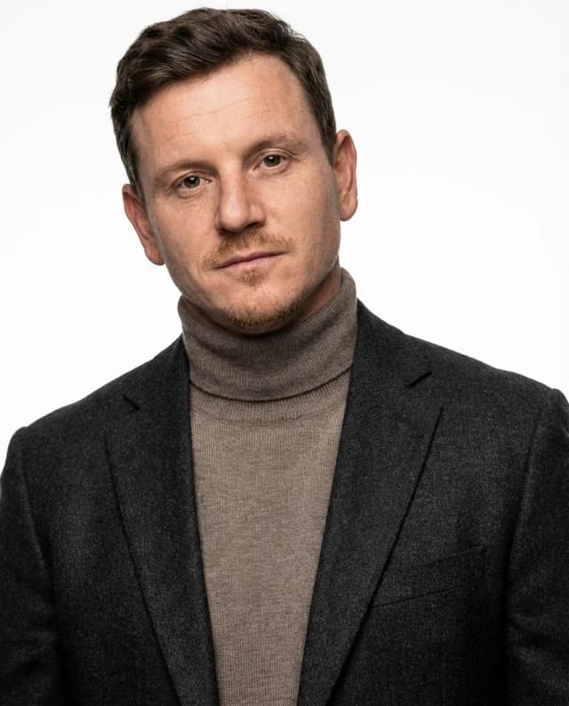 AI Interior Designer Headshot of a 40 man by ExecHeadshots