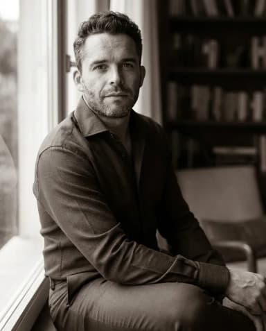 AI Interior Designer Headshot of a 45 man by ExecHeadshots