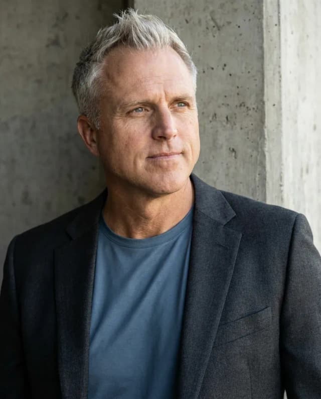 AI Interior Designer Headshot of a 55 man by ExecHeadshots