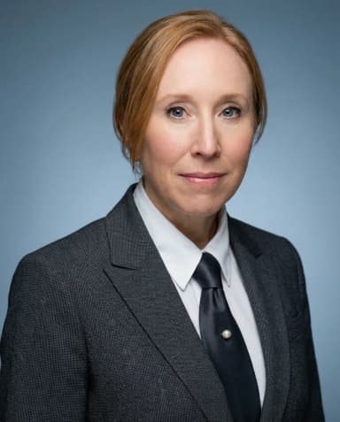 AI Linkedin Headshot of a 50 woman by ExecHeadshots