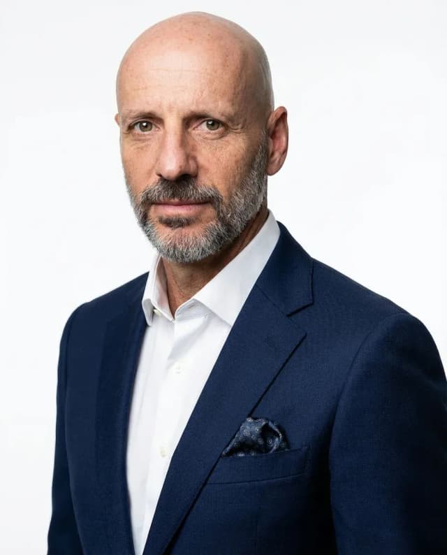 AI Linkedin Headshot of a 55 man by ExecHeadshots