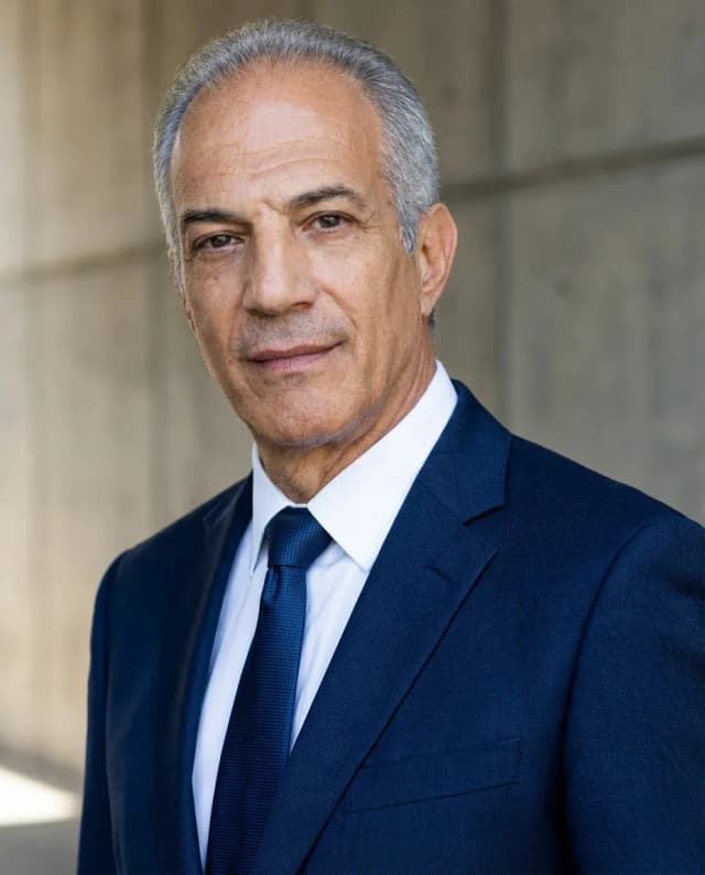 AI Linkedin Headshot of a 60 man by ExecHeadshots