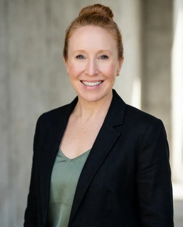 AI Real Estate Headshot of a 45 woman by ExecHeadshots