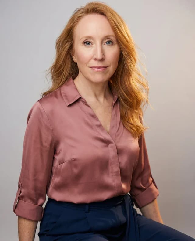AI Stylist Headshot of a 45 woman by ExecHeadshots