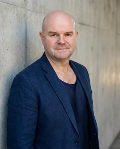 AI Therapist Headshot of a 50 man by ExecHeadshots