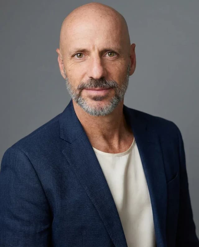 AI Therapist Headshot of a 55 man by ExecHeadshots