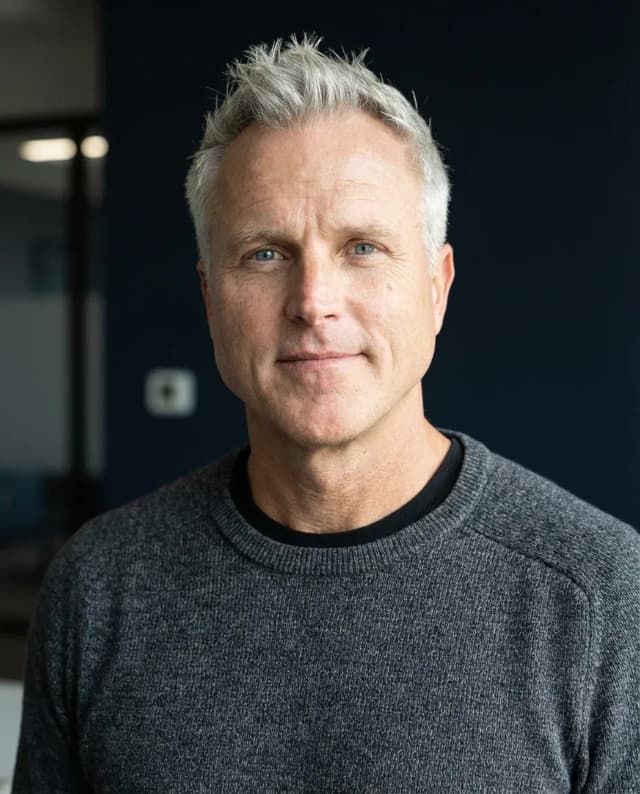AI Web Developer Headshot of a 55 man by ExecHeadshots