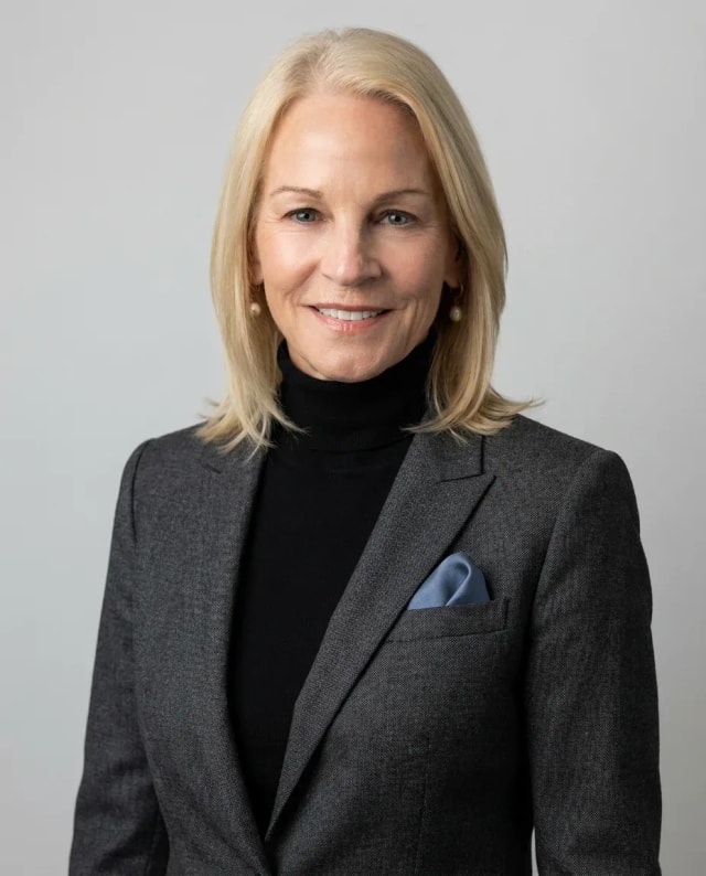 AI Architect Headshot of a 60 woman by ExecHeadshots