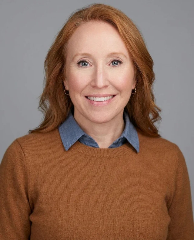 AI Coach Headshot of a 55 woman by ExecHeadshots