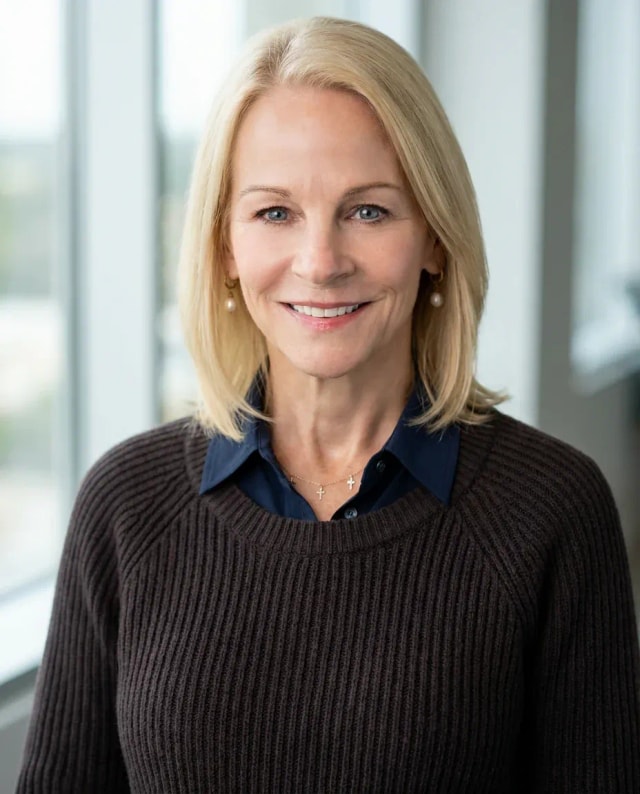 AI Coach Headshot of a 60 woman by ExecHeadshots