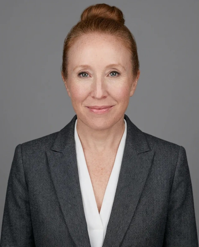 AI Corporate Headshot of a 50 woman by ExecHeadshots