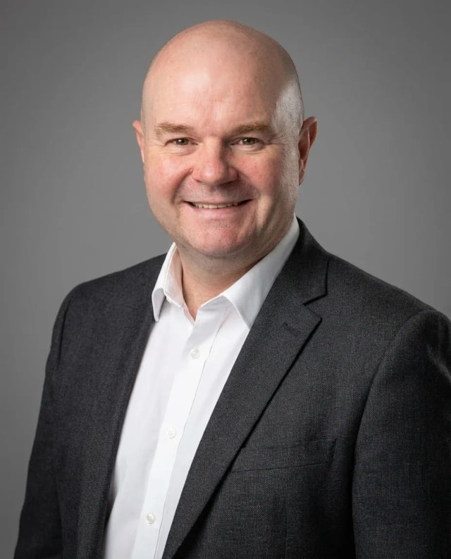 AI Dentist Headshot of a 50 man by ExecHeadshots