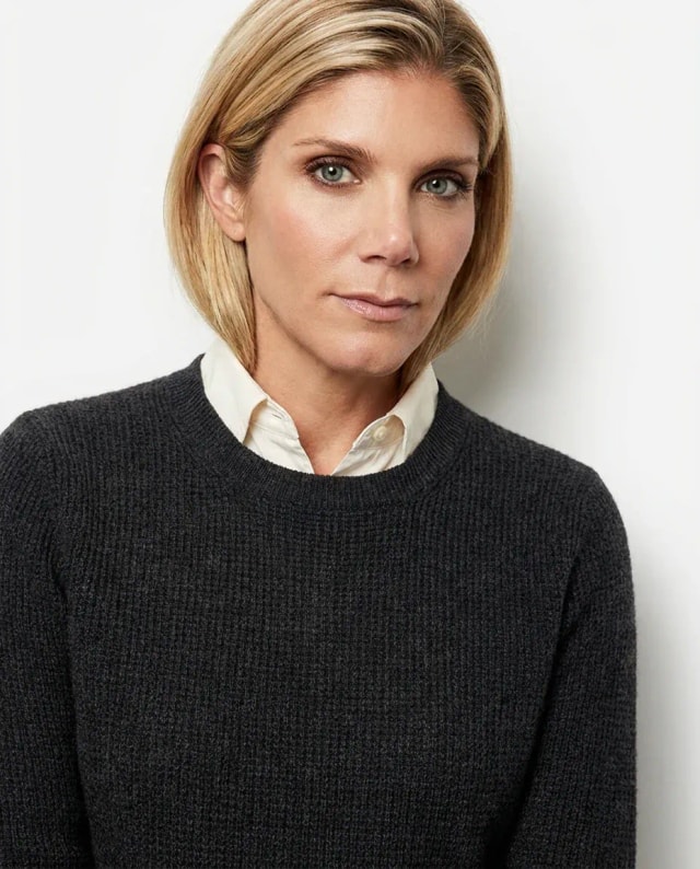 AI Engineer Headshot of a 45 woman by ExecHeadshots