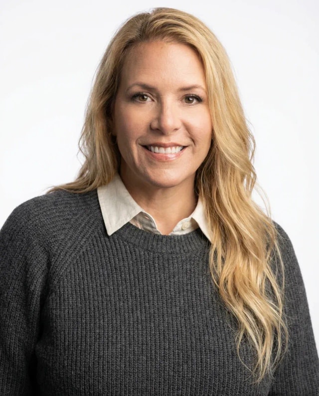 AI Financial Advisor Headshot of a 45 woman by ExecHeadshots