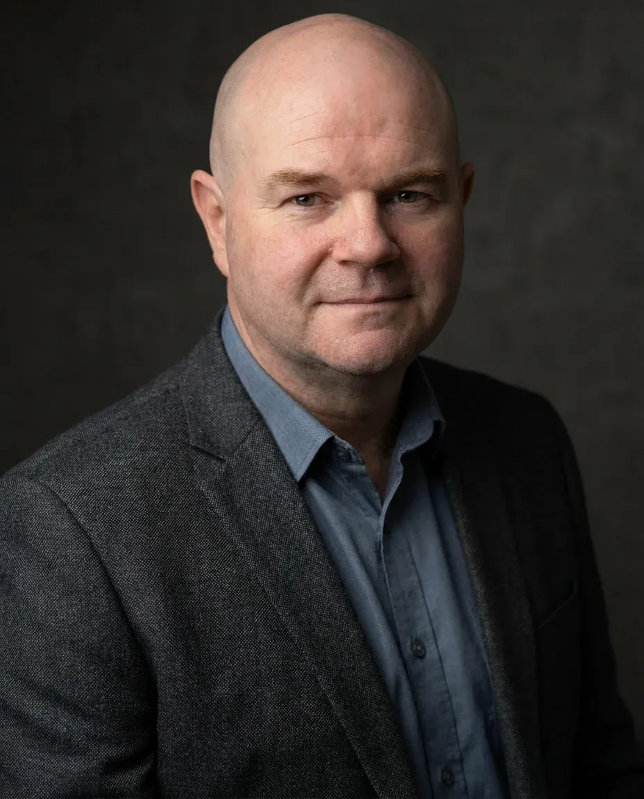 AI Insurance Agent Headshot of a 50 man by ExecHeadshots