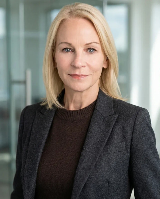 AI Insurance Agent Headshot of a 60 woman by ExecHeadshots