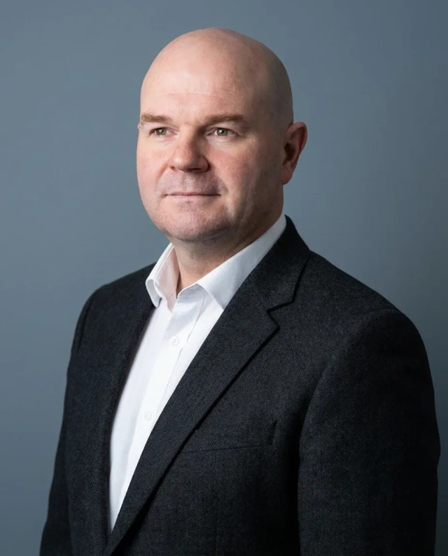 AI Linkedin Headshot of a 50 man by ExecHeadshots