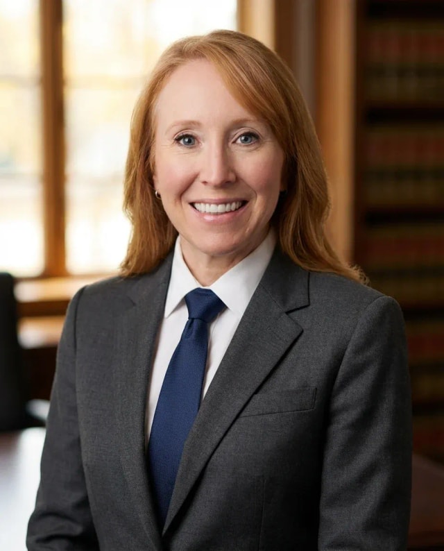 AI Speaker Headshot of a 50 woman by ExecHeadshots