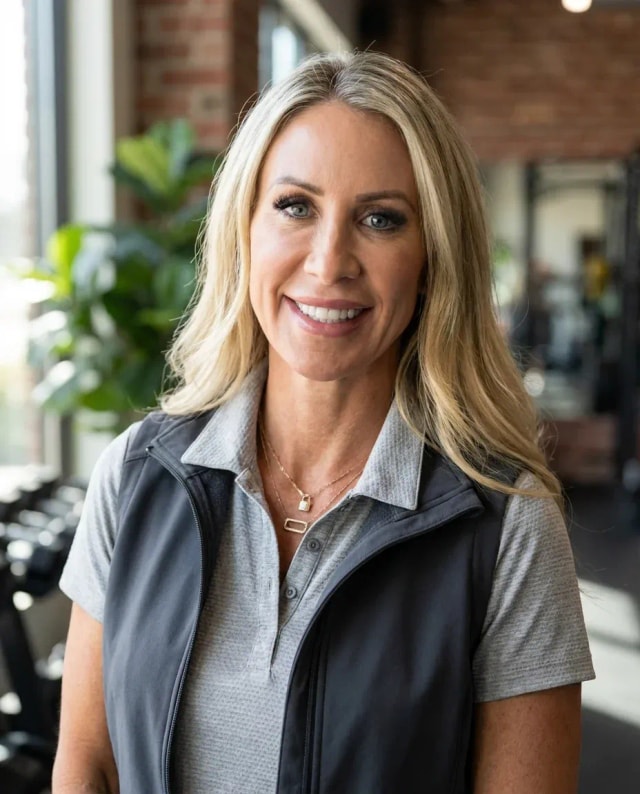 AI Trainer Headshot of a 45 woman by ExecHeadshots