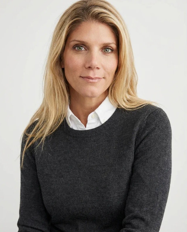 AI Web Developer Headshot of a 45 woman by ExecHeadshots