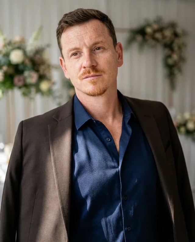 AI Wedding Planner Headshot of a 40 man by ExecHeadshots