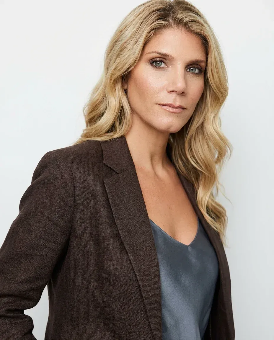 AI Wedding Planner Headshot of a 45 woman by ExecHeadshots