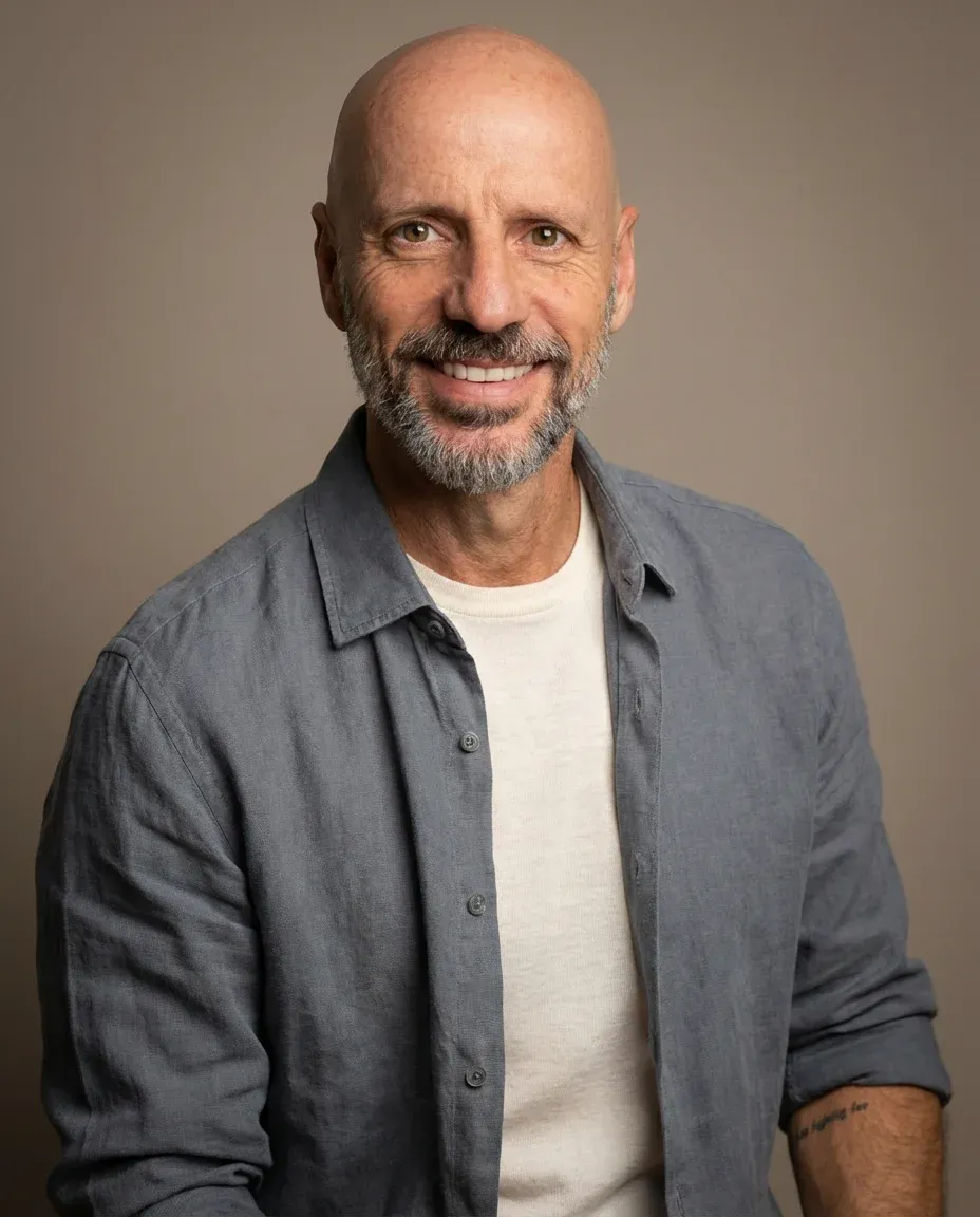 AI Writer Headshot of a 55 man by ExecHeadshots