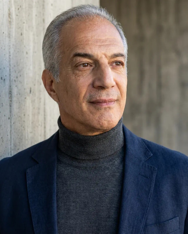 AI Writer Headshot of a 60 man by ExecHeadshots