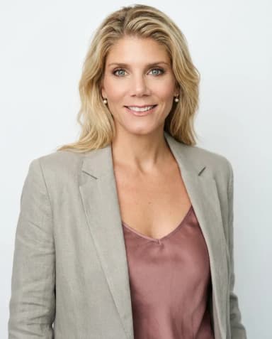 AI Coach Headshot of a 45 woman by ExecHeadshots