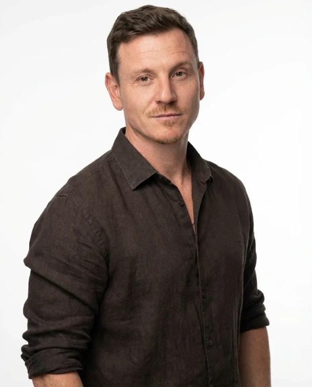 AI Comedian Headshot of a 40 man by ExecHeadshots