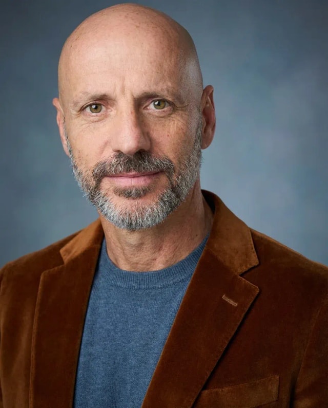 AI Comedian Headshot of a 55 man by ExecHeadshots