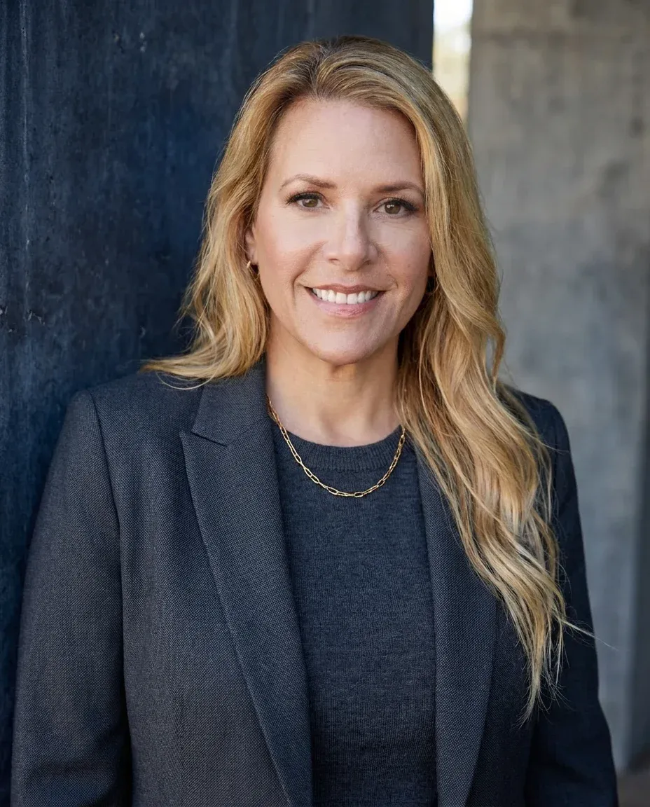 AI Graphic Designer Headshot of a 50 woman by ExecHeadshots