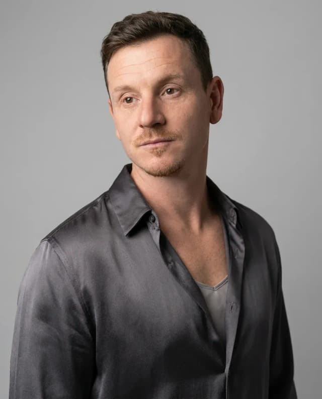 AI Makeup Artist Headshot of a 40 man by ExecHeadshots